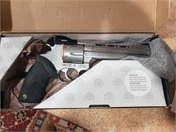 Taurus 44 mag with 6" Ported barrel, stainless...2010 manufacture, new from factory, box & paperwork