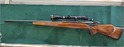 WEATHERBY MARK V 7MM REM MAG W/LEUPOLD SCOPE