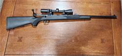 Savage 111 in 30-06 w/ scope and Iron Sights