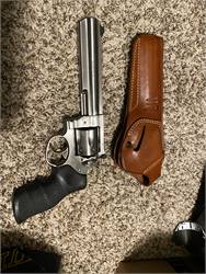 Ruger GP100 Stainless w 6” barrel and leather holster 