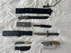 Several knives out of the collection - guardian tactical, ZT, benchmade, Tops