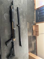 Mossberg 500 with adjustable stock and second barrel